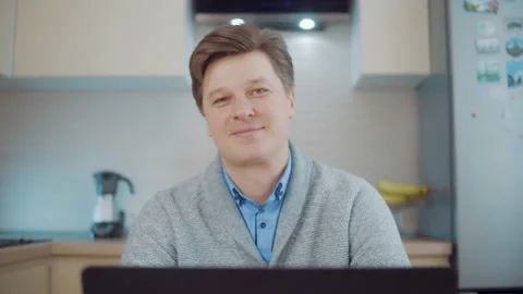 Cheerful attractive man smiling. Close-up Stock Footage 148340880