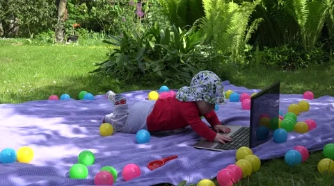 Cheerful baby boy play with computer and father take child. 4K Stock Footage 54931092