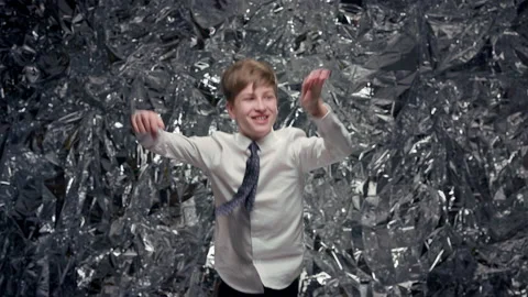 Cheerful Boy Dancing On Background Of Brilliant Scenery. Video stock 181544218