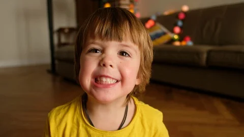 Cheerful boy looking at camera Stock Footage 129649041