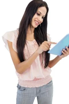 Cheerful brunette using tablet pc Foto stock