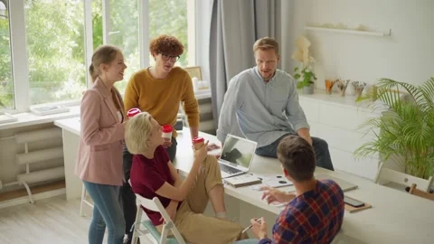 Cheerful business team chatting at coffee break Stock Footage