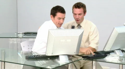 Cheerful businessmen celebrating a success Stock Footage