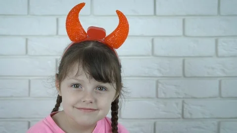 Cheerful child with devil horns. Stock Footage 113338385