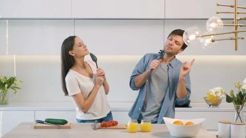 Cheerful couple having fun in the kitchen Stock Footage 149209279