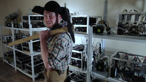 Cheerful cryptocurrency miner with pickaxe Vídeo Stock 87043306