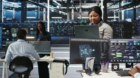 Cheerful data center employee using node tree software to analyze datasets 스톡 동영상 307018611