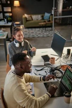 Cheerful Developers Working on Project Stock Photos