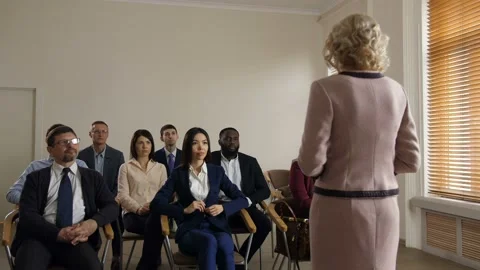 Cheerful diverse co-workers team greeting speaker Stock-Footage 108011297