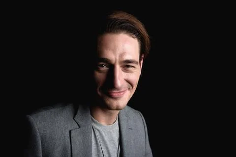Cheerful elegant guy is smiling Foto stock
