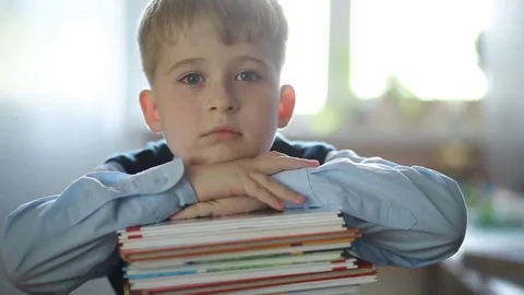  cheerful elementary school student with textbooks  Stock Footage 69158496