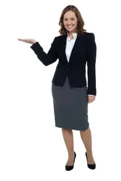 Cheerful executive presenting copy space Stock Photos