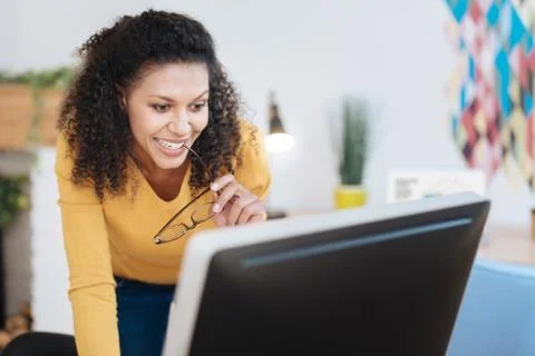 Cheerful freelancer working on her project Foto stock