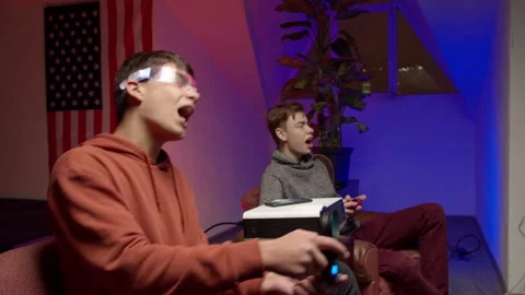 Cheerful friends singing and playing videogame together Stock-Footage 147398560