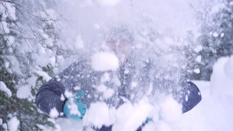 Cheerful frozen man in winter, falling snow, thumb up Stock Footage 101064396