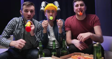 Cheerful funny guys dancing on sofa, rejoicing good finals of sport competition Stock Footage 194545832