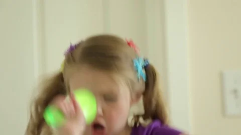 Cheerful girl dancing while singing at home Stock Footage