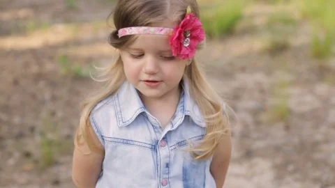 Cheerful girl in a summer park Stock Footage