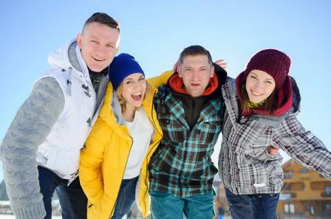 Cheerful group of friends posing for the camera. Stock Photos