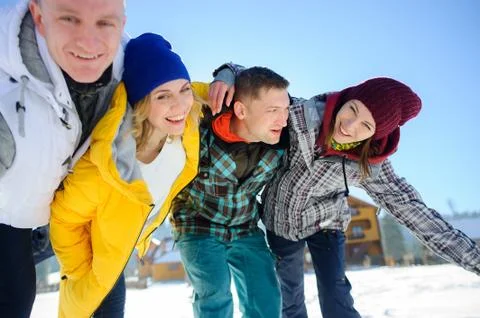 Cheerful group of friends posing for the camera. Stock Photos