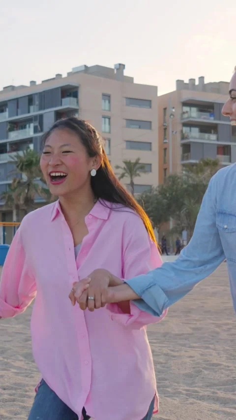 Cheerful group three beautiful young female friends running excited holding Stock Footage 274492411