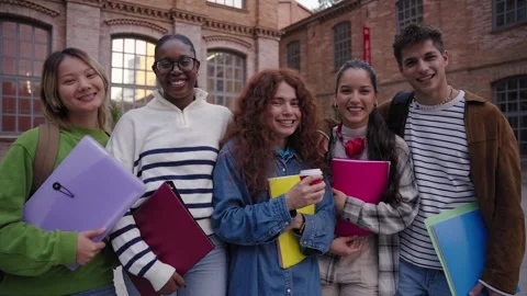 Cheerful group of young multiracial student looking at camera having fun Stock Footage 274137407