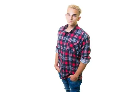 Cheerful guy in glasses posing in studio isolated on white background. Stock Photos