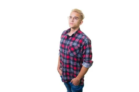 Cheerful guy in glasses posing in studio isolated on white background. 写真素材
