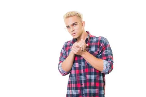Cheerful guy in glasses posing in studio isolated on white background. folded Stock Photos