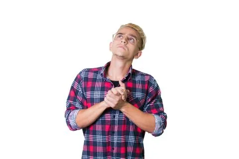 Cheerful guy in glasses posing in studio isolated on white background. folded Stock Photos