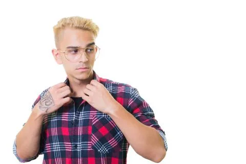 Cheerful guy in glasses posing in studio isolated on white background. straig Stock Photos