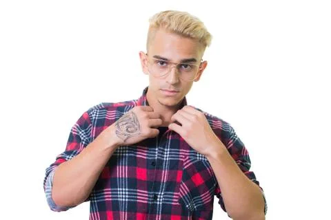 Cheerful guy in glasses posing in studio isolated on white background. straig Stock Photos