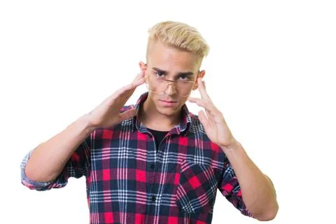 Cheerful guy in glasses posing in studio isolated on white background. Stock Photos