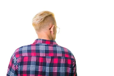 Cheerful guy in glasses posing in studio isolated on white background. Stock Photos