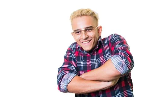 Cheerful guy in glasses posing in studio isolated on white background. Stock Photos