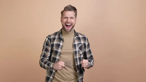 Cheerful guy support match goal fist up isolated pastel color background Stock Footage 176790565