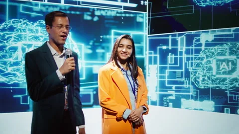 Cheerful host and expert guest talking at AI summit Video stock 278624014