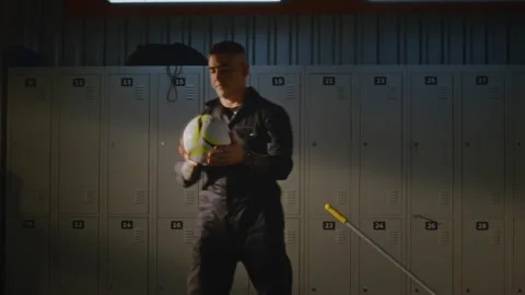 Cheerful Janitor Having Fun Juggling Soccer Ball with Feet and Knees Stock-Footage 338438908
