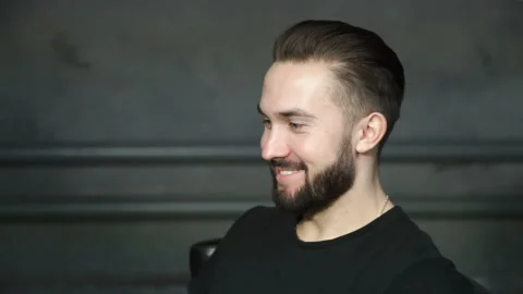Cheerful man with beard is laughing Stock Footage 86254776