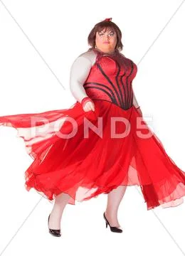 Cheerful man, drag queen, in a female suit Stock Photos