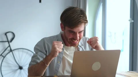 Cheerful man holding camera for a video call at Stock Footage 332685476