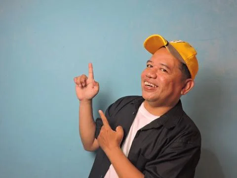 Cheerful Man Pointing Up Stock Photos