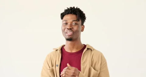 Cheerful man smiling and explaining 스톡 동영상 156543440