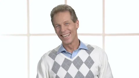 Cheerful mature man talking to camera. Stock Footage 86621594