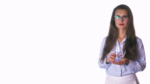 Cheerful mid-age hispanic latin woman hold a water glass Stock Footage 131881301