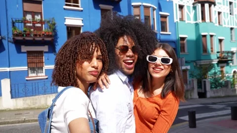 Cheerful multi ethnic friends taking a selfie in the city Stock Footage 309200089