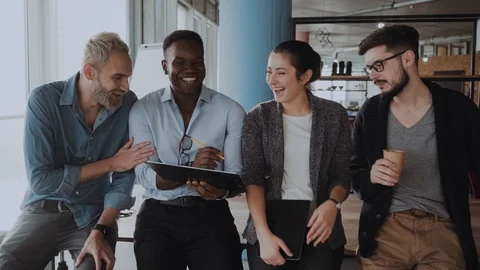 Cheerful multiethnic team people workers students laughing at funny joke Stock Footage 99297934