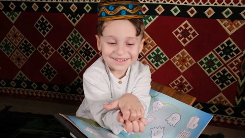 Cheerful muslim boy Stock Footage 172566196