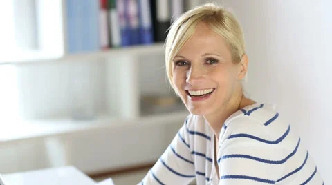 Cheerful office worker looking at camera Stock Footage 38061050