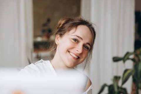 Cheerful painter using easel at art studio Stock Photos